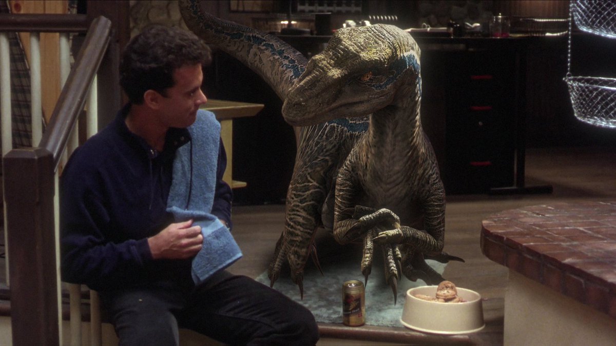 Turner and Hooch (1989) but with a Velociraptor