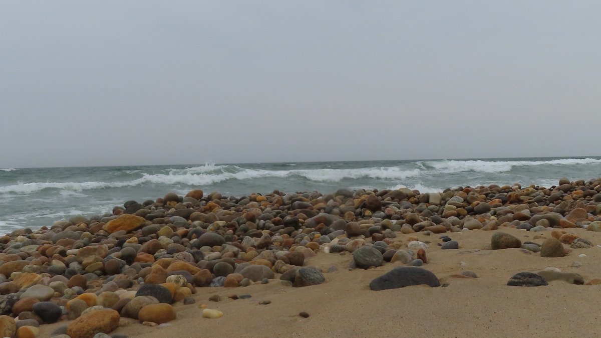#GetIntoTheOutThere Montauk 'ST. Patrick's Day' 2023 Atlantic ocean NY LI. No sun as beaches are shrinking found pile rocks (riptide?) gathered. Sunset?