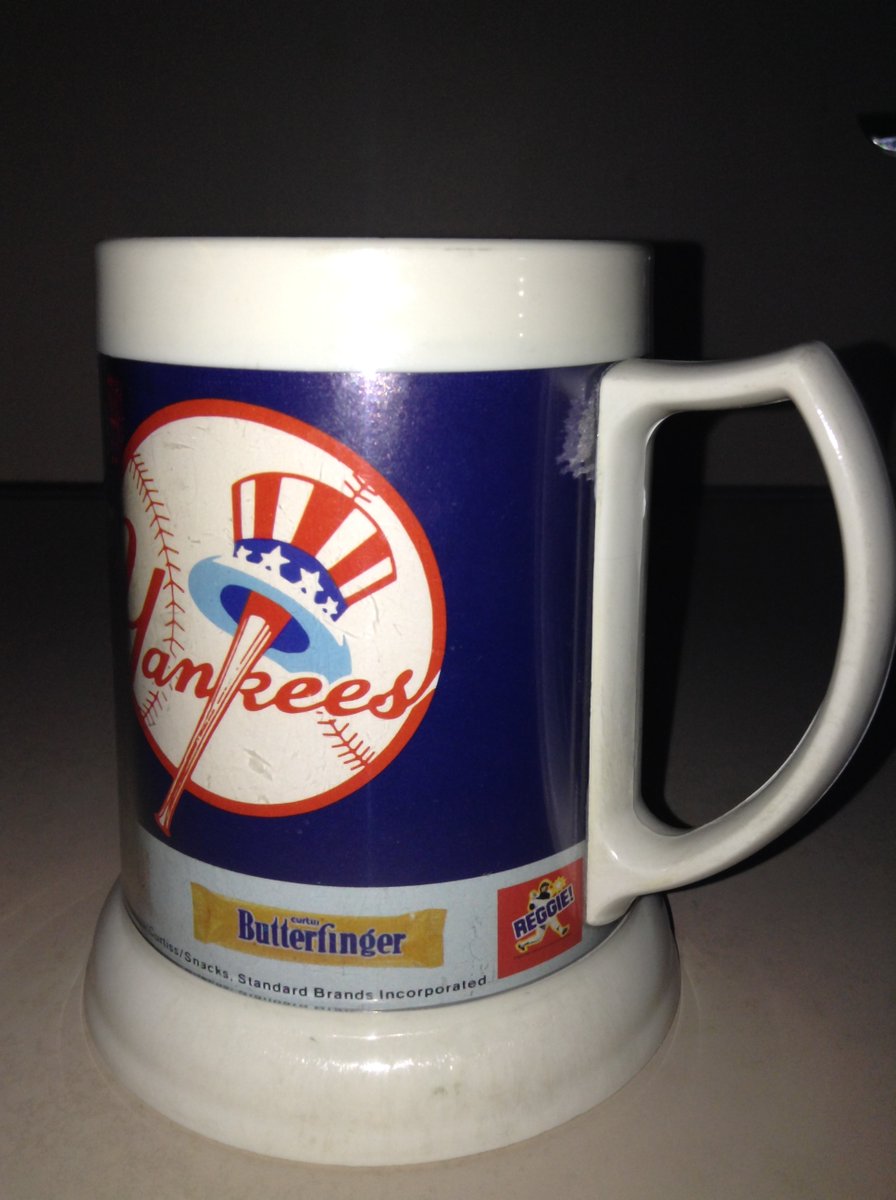 BallparkTeddy's tweet photo. @mroctober @thereggiebar My first Yankee game was Fan Appreciation Day in 1978 (age 10). The giveaway was a mug containing fun-size Reggie bars, and when he homered in the 5th, the Reggie bars came raining out of the upper deck and onto the field. 
@MrOctober @thereggiebar https://t.co/zVBbGW0Uj7