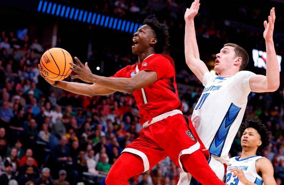JeremyJSims's tweet photo. In the Year of our Lord 2023, patriots of NC State - starving &amp; outgunned - charged the courts of Denver. They fought like warrior poets; they fought like the Wolfpack... and won the hearts of Wolfpack Nation. 
@PackMensBball

Photo credit: Ethan Hyman @ethanhyman @newsobserver https://t.co/MS7ILDNngC