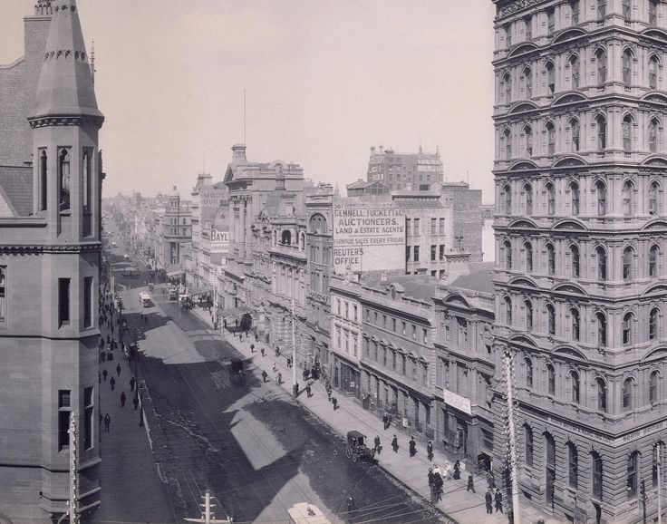 bloodiedwombat's tweet photo. Collins St, #Melbourne east from Queen St along what was arguably the city's finest block in 1903. Today only ONE building on S side between here and SWANSTON St still exists as shown (and even that one has had a major architectural feature removed).

Who can tell me which one? https://t.co/Jdg9ajzxvH