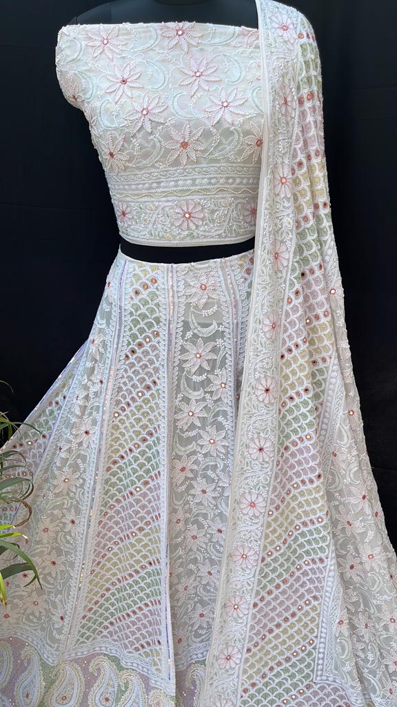 AwadhChikan's tweet photo. Avadhchikan presents the premiere of this beautifully handcrafted stunned Pure Georgette Lehenga embellished with Beads, Aari, Mirror, and Cutadana work. 
#puregeorgette #lehengacholi #chikankaricollection #lehengawedding #beadswork #aariwork #bridallehenga https://t.co/lYU2tCEata