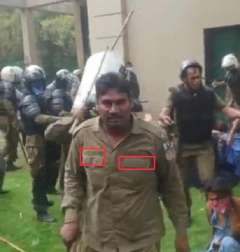 Where is his number plate?