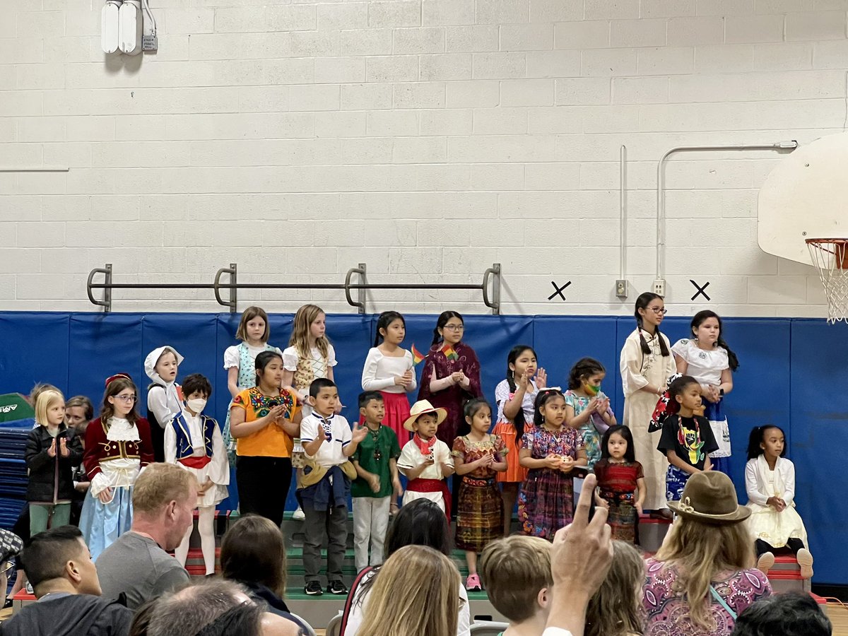 lsullivan's tweet photo. Barrett teacher Ms Vega, a former #KWBPride student, was a fabulous host for our United Nations family assembly! We also enjoyed Bolivian Tinku dance performance by another Barrett alum! #APSisAwesome @APSVirginia @cdiaztorres240 #school #community https://t.co/7tx1am3dG5