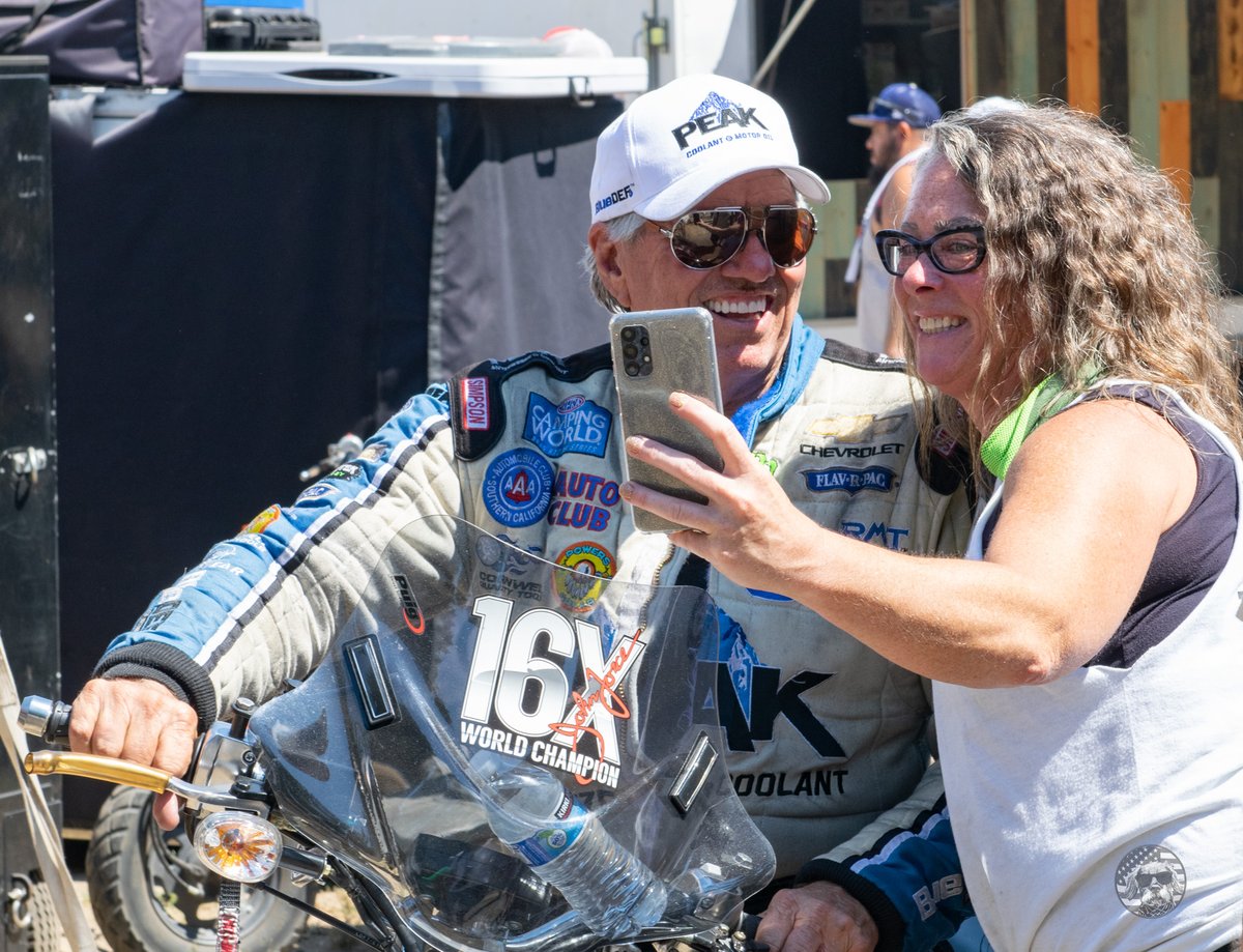 This is a common scene at NHRA national events.  

@JohnForce_FC taking photos with fans and cruising on his scooter at the @NHRA NW Nationals, @theplacetorace, July 31, 2022.

#dragracing #SpeedLivesHere #SpeedForAll