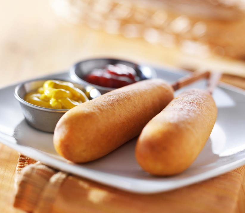 Happy National Corn Dog Day! 🌭🎉 Celebrate with our delicious pogos, the perfect combination of a juicy hot dog and crispy cornmeal batter. Get yours now and satisfy your cravings! #NationalCornDogDay