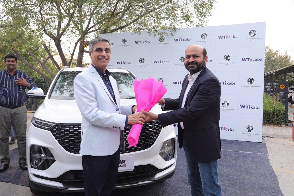 rushlane's tweet photo. 🚘🤝🚕 MG Motor India &amp; WTiCabs sign an agreement for 100 vehicles - MG Hector &amp; #MGZS EV, for the Rent-a-car division. This partnership will make MG vehicles more accessible to SUV/EV enthusiasts and offers sustainable mobility solutions to corporate clients #MGIndia #MGHector https://t.co/TLQTLNjdQD