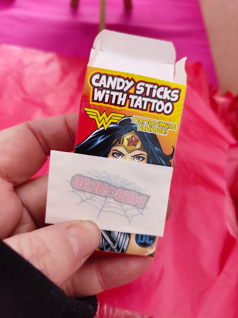 Here's another R for you! Retro! While having a go on the Tombola - as you do - I nabbed a box of these (with permission) and you still get the tattoos in them! Check me out - regressed from 40 years old to 8 in an instant! 

#tattoo #candysticks #MHHSBD #AlphabetChallenge