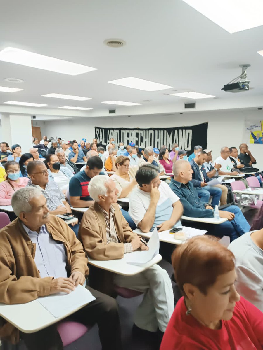APUCV's tweet photo. Inicia en nuestro auditorio la Asamblea Nacional de Trabajadores en Lucha.
Un esfuerzo unitario orientado a fortalecer la lucha por #SalariosYPensionesIndexadas , libertad sindical y el derecho a la negociación Colectiva.
#18Mar #ANTL https://t.co/REV9qKlqmD