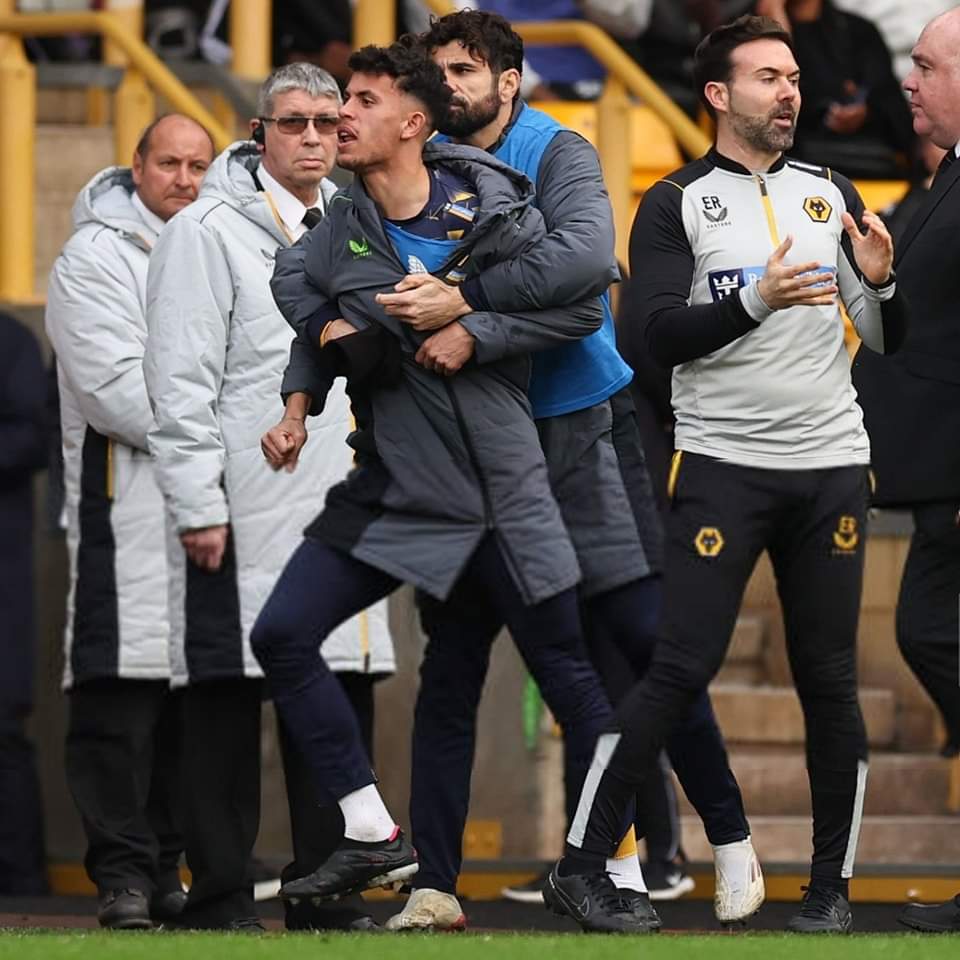 Wolfpackwwfc's tweet image. Replays have shown that Matheus Nunes DID NOT push the lines man, in fact the lines man walked backwards into Nunes... That red card must be overturned!

Absolute sham @FA_PGMOL, Nunes and Wolves have every single right to be Angry! #wwfc #wolves