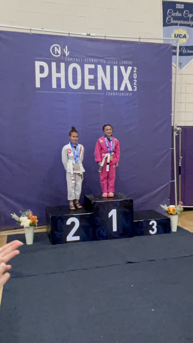 CoachVo11's tweet photo. ✅ She did it! So proud of Lennix. 
🥇Gold medal in the Compnet Phoenix Jiu-Jitsu Winter Championships. 
Brave girl in a chaotic environment. 

Thank you to Gracie Barra Portales and Avondale for getting her ready. 
#meanbug https://t.co/xLqnGheBjr