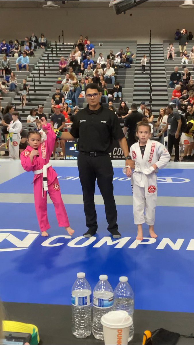 CoachVo11's tweet photo. ✅ She did it! So proud of Lennix. 
🥇Gold medal in the Compnet Phoenix Jiu-Jitsu Winter Championships. 
Brave girl in a chaotic environment. 

Thank you to Gracie Barra Portales and Avondale for getting her ready. 
#meanbug https://t.co/xLqnGheBjr