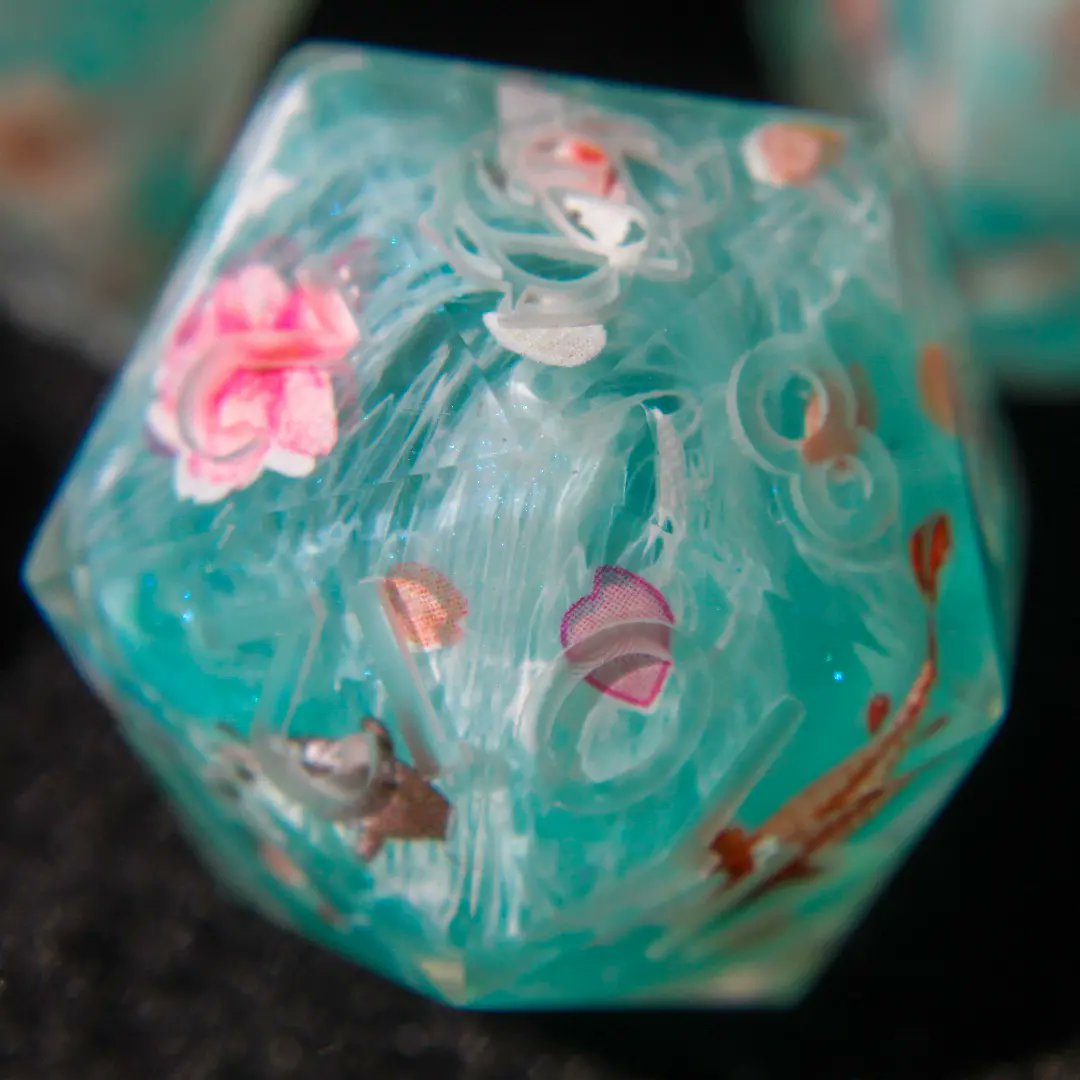 Helichrysumdice's tweet photo. Petals in the pond 🌸
Not sanded nor inked yet.

#handmadedice #dicemaker #dice #ttrpg #dnd5e #pathfinder2 https://t.co/IvVaIyeriP