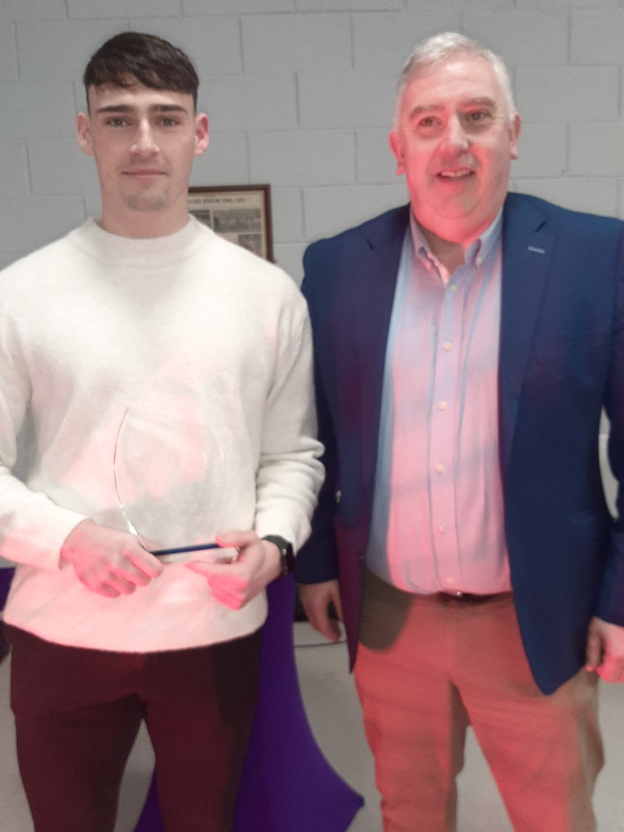 OfficialWexGAA's tweet photo. Robbie Brooks of @CastletownM, the @glenfuels Footballer of the Year 2022, receives his award from Tom Hipwell of Glen Fuels. #congrats https://t.co/LuWzF3HD6s