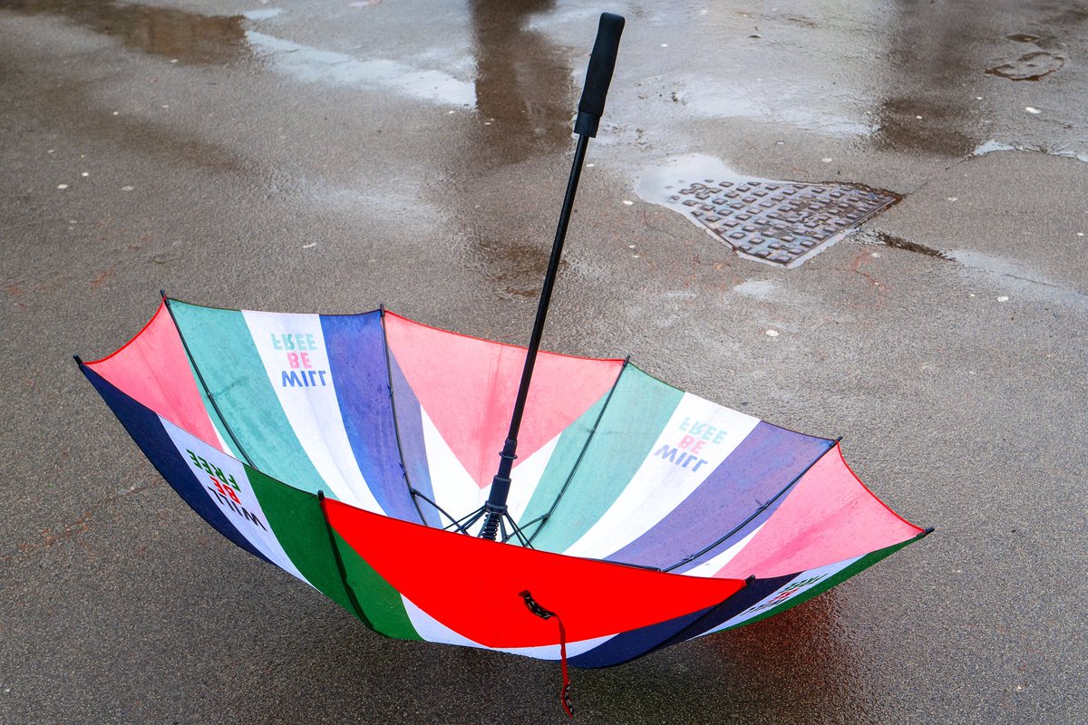 GavinRossPhoto's tweet photo. Umbrella with the colours of the Palestine flag and the words ‘Will Be Free' abandoned in George Sq, Glasgow during a ‘Stand up to Racism’ demo on 18th March 2023. #umbrella #notoracism #palestine #willbefree #leica #LeicaQ2 https://t.co/TZHmwTT1TT