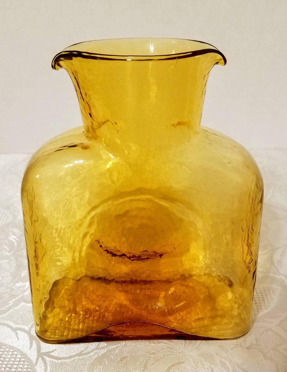 Excited to share the latest addition to my #etsy shop: Blenko Amber Glass Double Spout Carafe #384 etsy.me/3JMS29B #blenko #fenton #carnivalglass #amberglass #fentonglass #collectableglass #retro #indianaglass #artglass