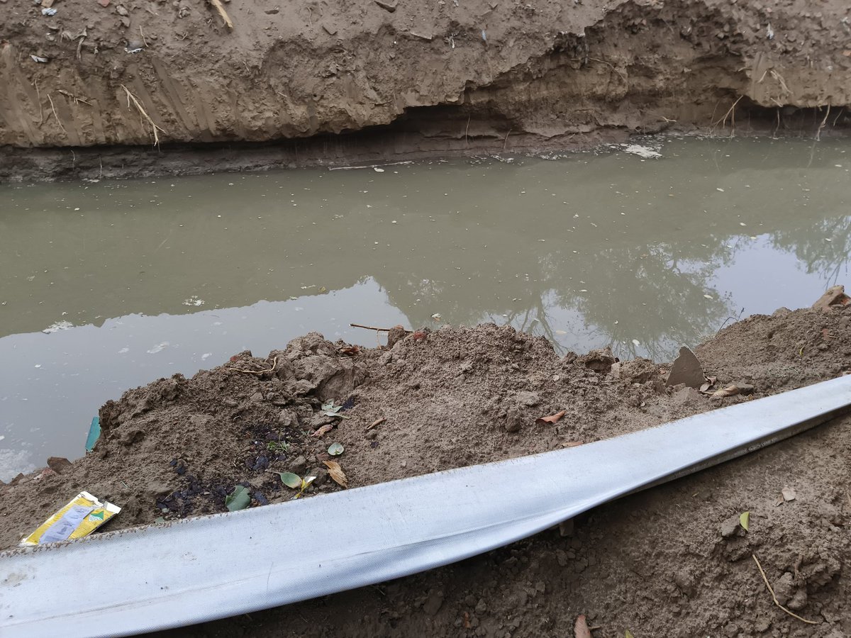 BhanuPande4's tweet photo. @OfficialGMDA  GMDA removed covered drain Palam Vihar for widening. Now sewage running in open drain with rain water. Stagnant. Side walls collapsed so drain blocked. Cesspool created in middle of colony. GMDA seems helpless. Needs urgent action 
@TOIGurgaon https://t.co/1IFETiLpaA