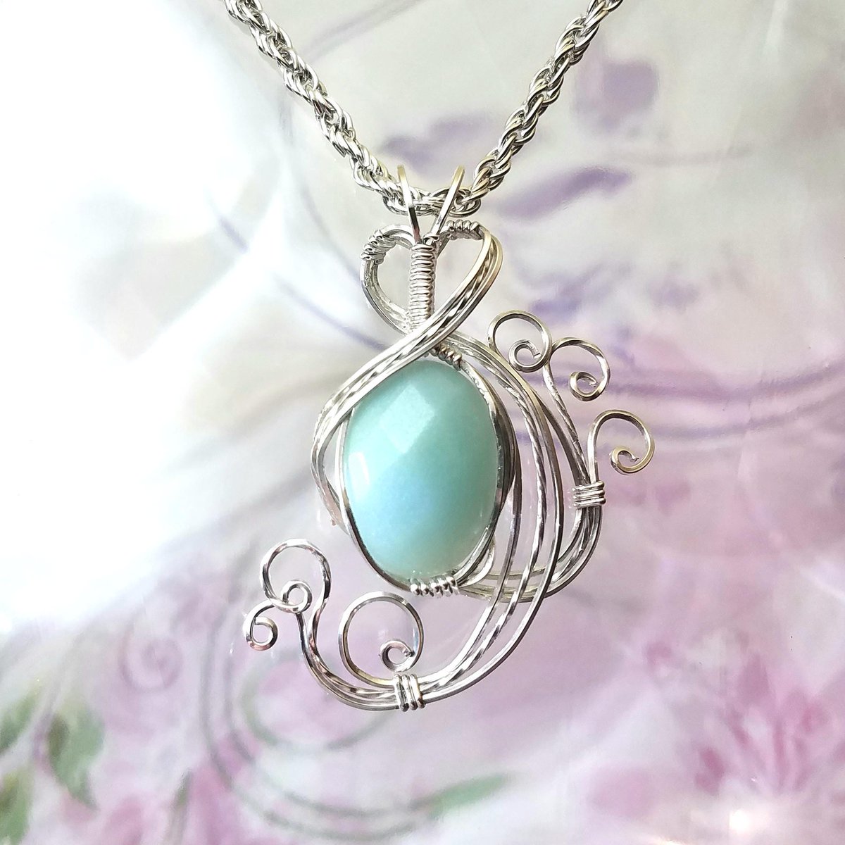 ces614's tweet photo. Green Amazonite Womans Pendant Wire Wrapped Jewelry Handmade in Silver With Free Shipping https://t.co/hQ7L8PNUAh #EarthArtsNW #giftsforher #handmade #jewelry #Etsy #GreenAmazonite https://t.co/BjIhus5xFR