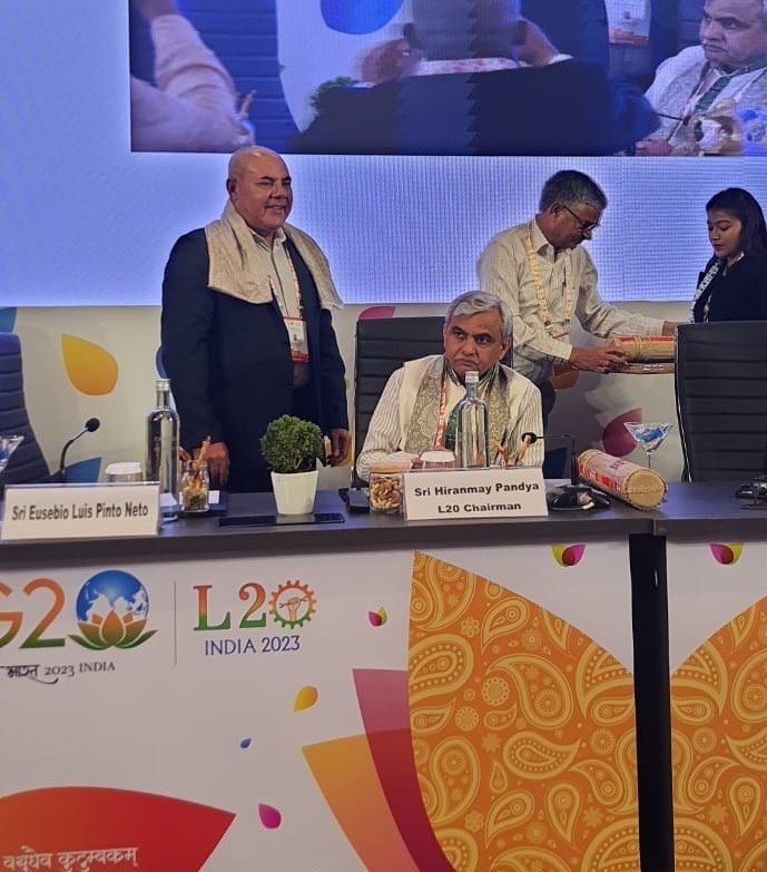 L20india's tweet photo. The workforce of the world is #onefamily, says #L20 Chair & @BMSkendra president, Sh. Hiranmay Pandya at #Inceptionmeet in #Amritsar https://t.co/zIZurl1t3a