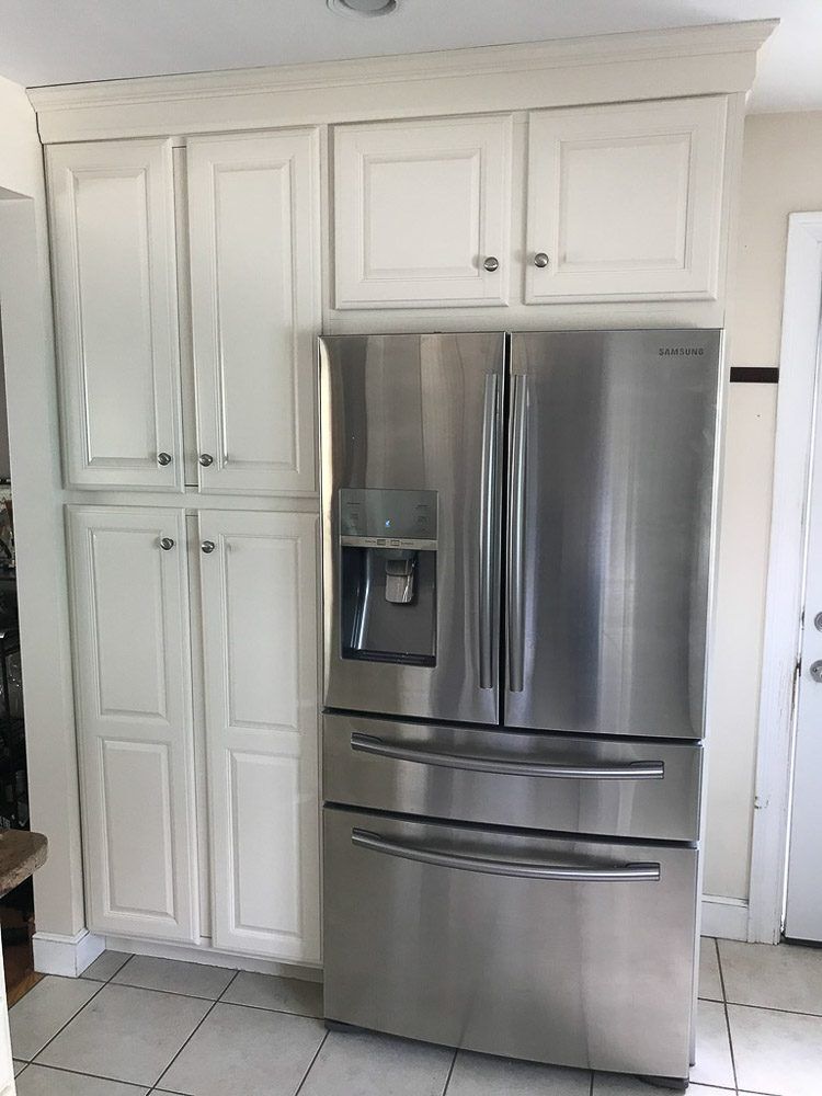 Are you ready for a cabinet makeover? Transform the look and feel of your cabinets with our professional cabinet refinishing services. See how a few coats of paint can completely change the look of your home! ☎️ Call us today! (617-838) 3014 #cabinetrefinishing #paintjob