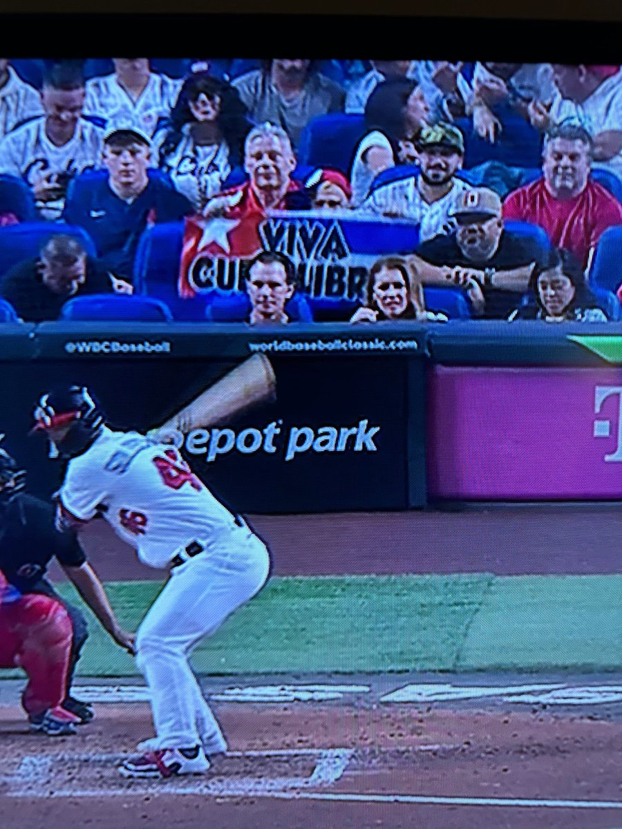 ChrisCorrea15's tweet photo. Some of the protests during the USA vs Cuba semifinal game of the World Baseball Classic. Also saw video of demonstrations outside Marlins Park prior to first pitch. Now fans behind homeplate seem to be distracted with something near the Cuban dugout. https://t.co/Q3sax5sry9