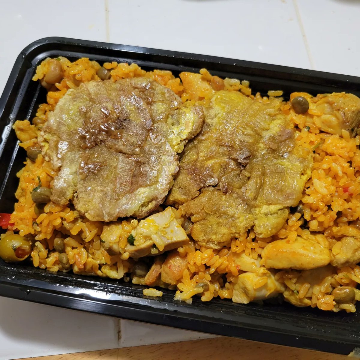 Trillisas, Pernil w/Mamposteao Rice, and Arroz Con Pollo from OSJ International Restaurant #puertoricanfood