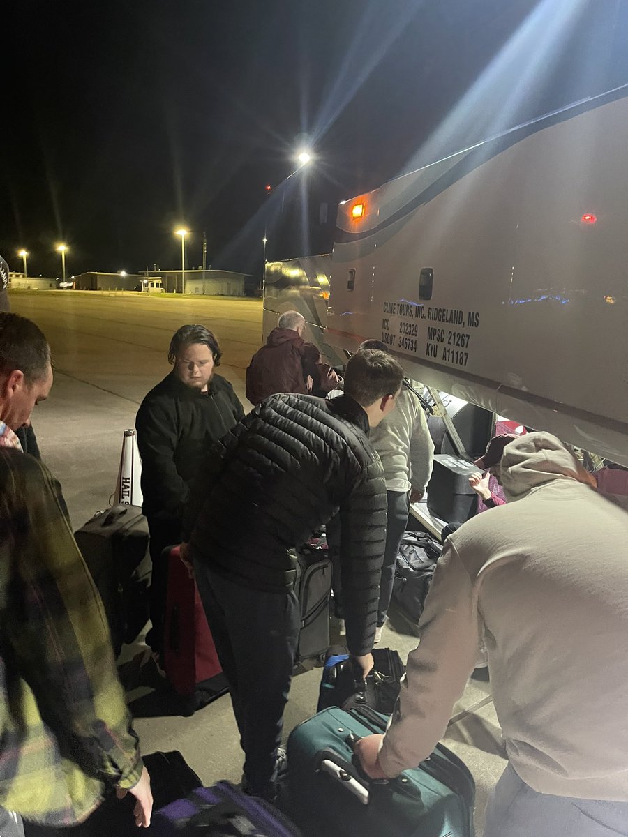 CoachTyConner's tweet photo. Huge shoutout to members of the @maroonband for “playing Tetris” and loading everyone’s luggage onto our bus back to Starkville! 

#HailState🐶 https://t.co/zUWrmD7Hph