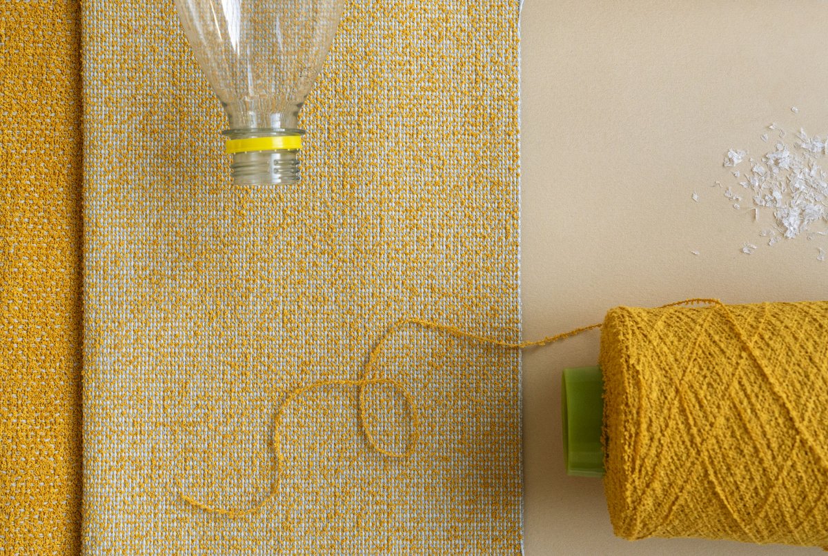 Vescom's tweet photo. We’re constantly researching new alternatives and exploring future materials – always with an eye to sustainability. Made from post-consumer PET bottles, our almost 100% recycled polyester FR boucle yarn turns the problem of plastic waste into a solution: https://t.co/svwg3phyLE https://t.co/KUaRBM8G03