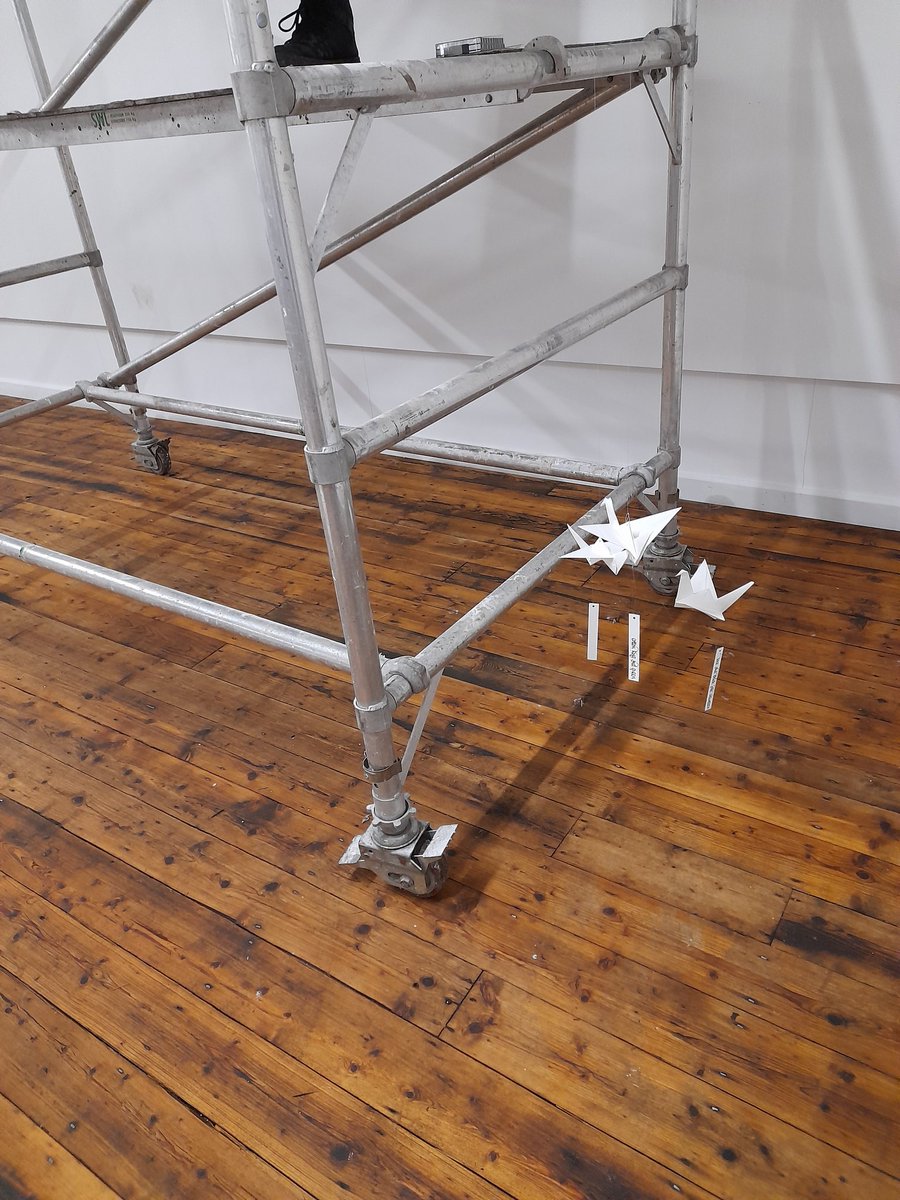 BrianTheScriber's tweet photo. Here are 1,000 paper birds on my bench @CrossStreetArts Each bird will carry a line from a haiku created in @louisethepoet workshops. To be shown in a beautiful huge murmuration @SpinnersMill starting March 25th. Come, see, It will be a visual wonder... @Healthy_Arts @TNLComFund https://t.co/Hg5IFbmu6b