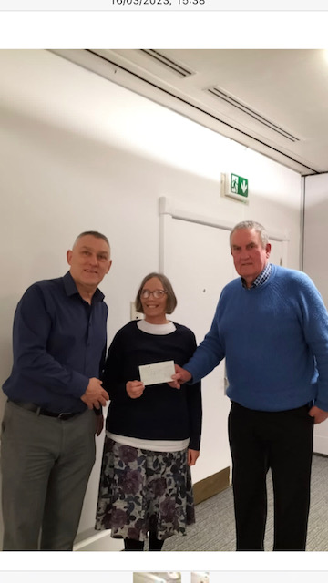 Southport League Referees who donated a match fee to the Charity Cup last season a big thank you. Chairman Bill Halfpenny pictured handing over a cheque for £500 to the North West Motor Neurone Disease Association on their behalf.