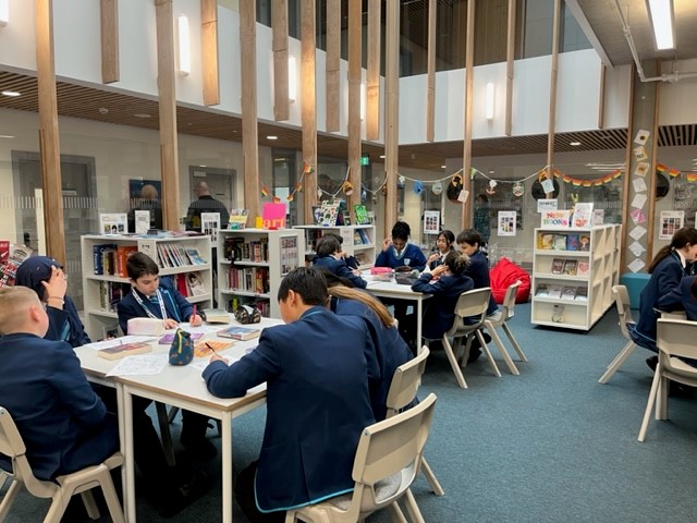 HASULibrary's tweet photo. Kicking off the week with The Reading Game - Year 7 classes are timed to discuss genres of books to decide which ones have the best covers, blurbs and first page. Lots of fun and lots of books borrowed! #thereadinggame @CarelPress #readingforpleasure #learningaboutbooks https://t.co/qZAMXSTUxN