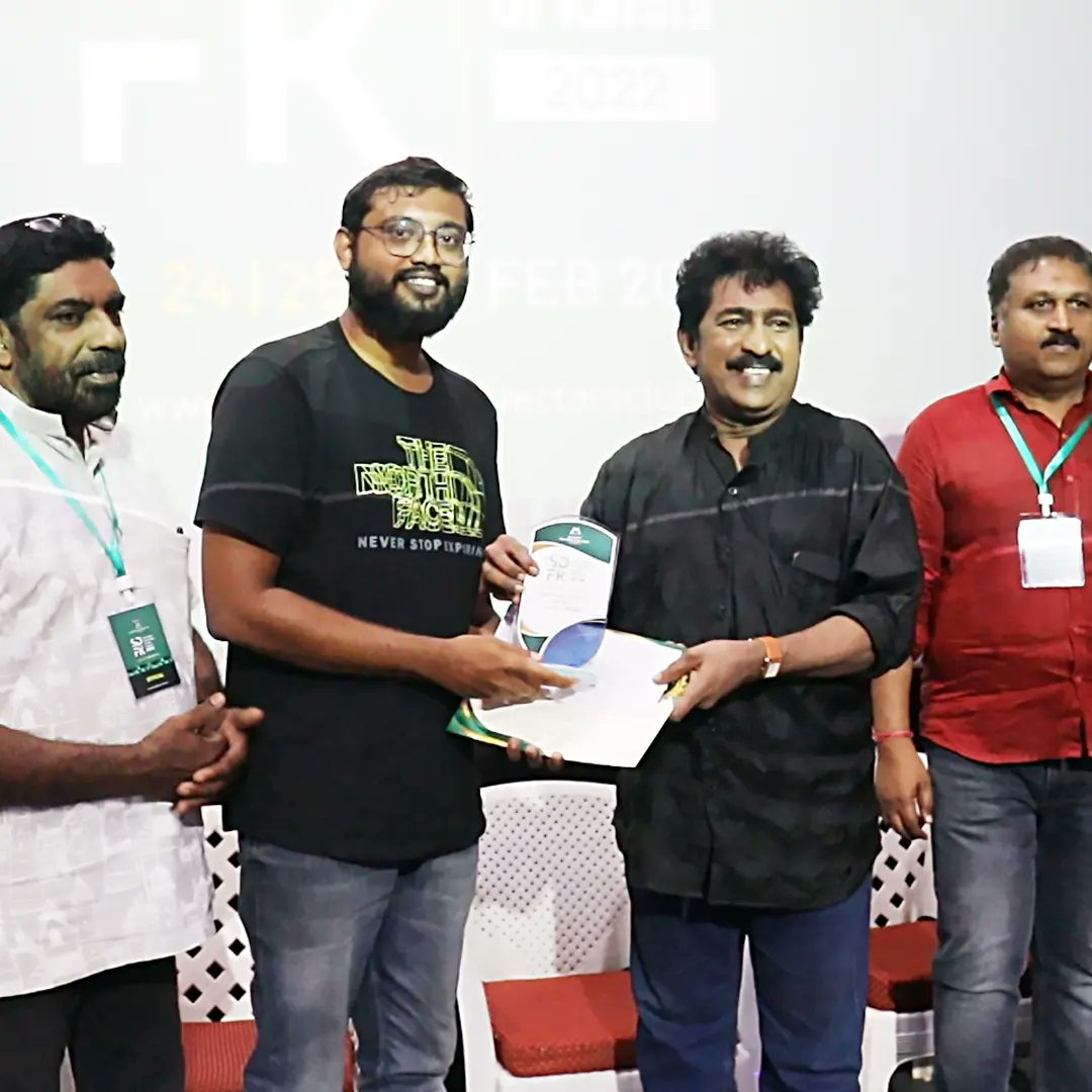 poputchikindia's tweet photo. Drumming Into Silence has won the Best Documentary Award in the Short Film and Documentary Festival of Kerala, 2022 held at Calicut organised by the Malabar Film Directors Club. 

It was an honour to receive the award from Kerala Chalachitra Academy Vice-Chairman Prem Kumar. https://t.co/ptOxytQb59