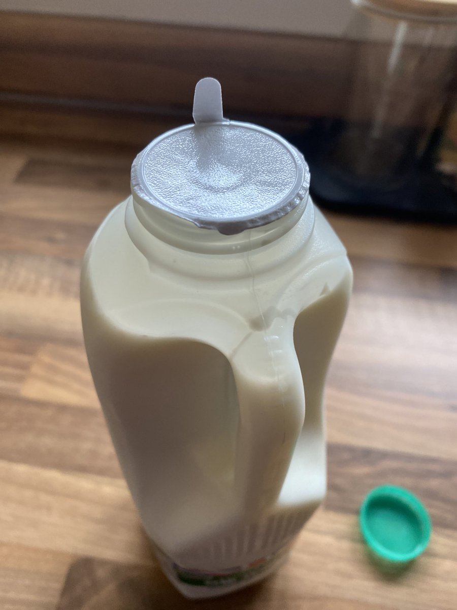 TheKateGrindal's tweet photo. Well that’s my coffee ruined, thanks @asda! Newly opened bottle, kept in the fridge, and use by date of tomorrow. Surely it should be fine? What a waste! https://t.co/Yo0O4PxyPi