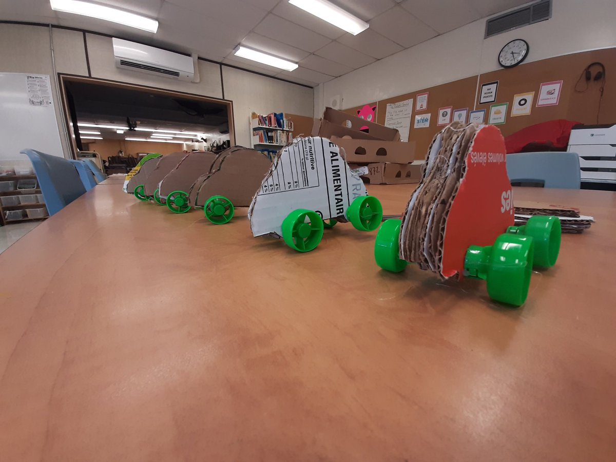 Cardboard cars, Applesnax lid wheels. Grade 5s in the <a href="/DunrankinPS/">Dunrankin Drive PS</a> LLC have been making them for our kindergarten classes #makered #EML