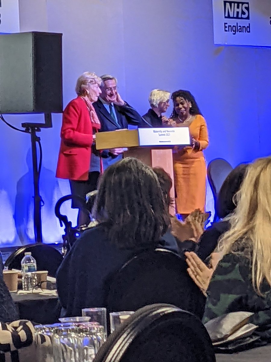EmmaHawesTaylor's tweet photo. "I have two men in my life" - @JuliaCumberlege brings the house down as we say thank you to her and Sir Cyril, and a standing ovation for @TeamCMidO JDB 
They have all contributed so much to maternity and leave an incredible legacy.
#MatNeoSummit2023 https://t.co/HpW6ZTSFqO