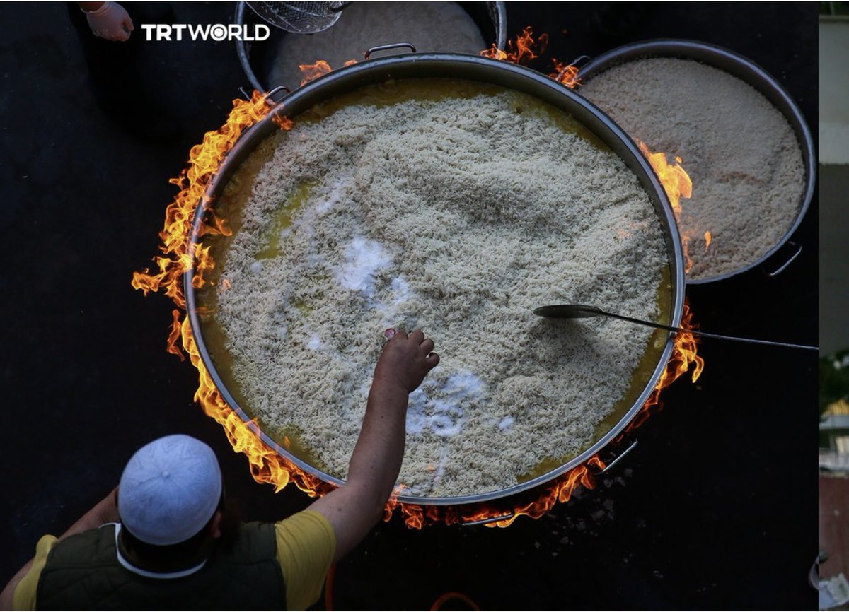 TurkVolunteers's tweet photo. Every day, a group of dedicated Uzbek volunteers wake up early to cook their traditional rice, known as osh, in massive cauldrons for some 16,000 earthquake survivors in Türkiye’s quake-hit areas.

Photos: Halil Fidan / AA 

#türkiye #turkey #earthquake #turkeyquake #disaster https://t.co/j7Rd3eIwb0