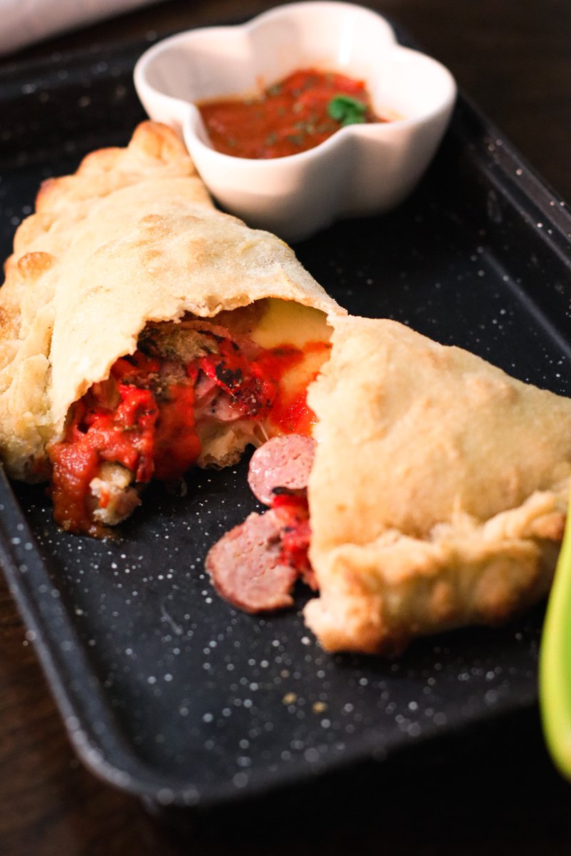 fantasiayeg's tweet photo. Italian folded pizza = Calzones =  SIMPLY IRRESISTIBLE :)

Italian Spicy Sausage Calzone!     Join us for lunch!   $10.95     #yeg #yegfood #yegfoodie #yeglocal #yegeats #foodporn #foodblogger #yegdt #yegpanini #calzone #yegpizza #foodstagram https://t.co/LyFLCXMigm