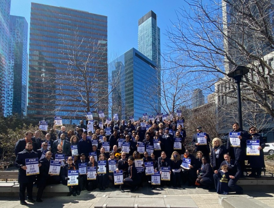 .@TWULocal579 inflight crewmembers picketing outside @JetBlue HQ in New York to demand the company meet its obligations. Failing to honor the CBA doesn't fly here. #SolutionsNotExcuses