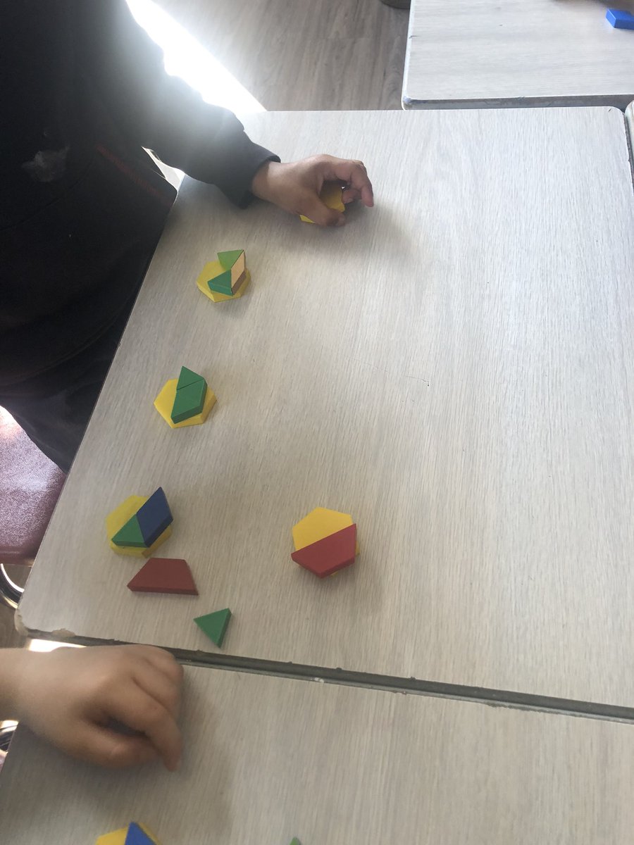 MsEccles's tweet image. Can you show me one half using the pattern blocks? How can we do that? How many ways can you make one half? @dsbn @PoWThoroldPS @powthorold @PisekKelly @plat_edu #mathchat #mathtwitter #teachingmath