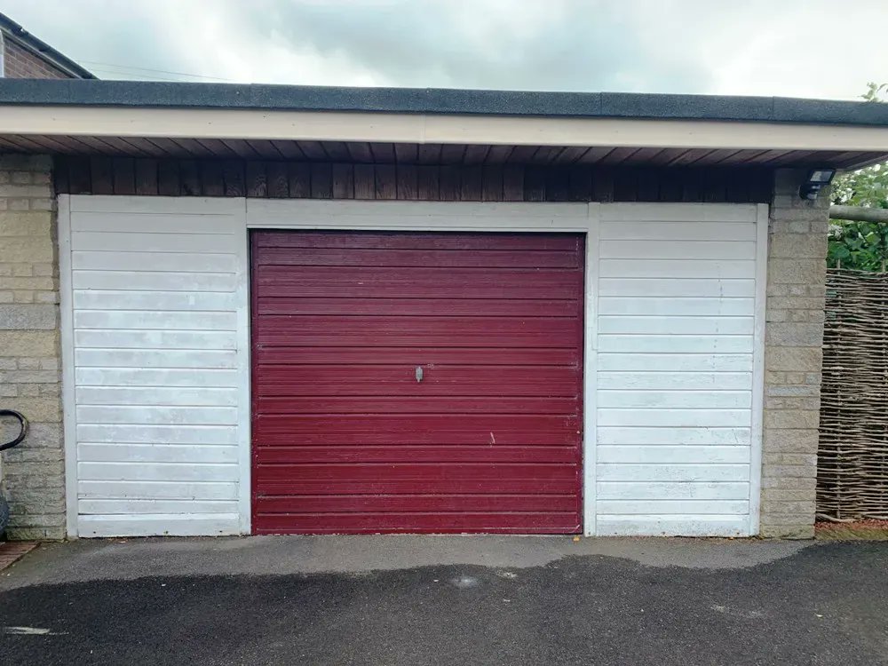 SEGARAGE's tweet photo. This beautiful stone garage had a 1970s abomination of a #garagedoor and side infills. It looked hideous and was no doubt affecting the value of their house. Our #solution here: https://t.co/ZMPDp6e7PR https://t.co/WtyDE6oU13