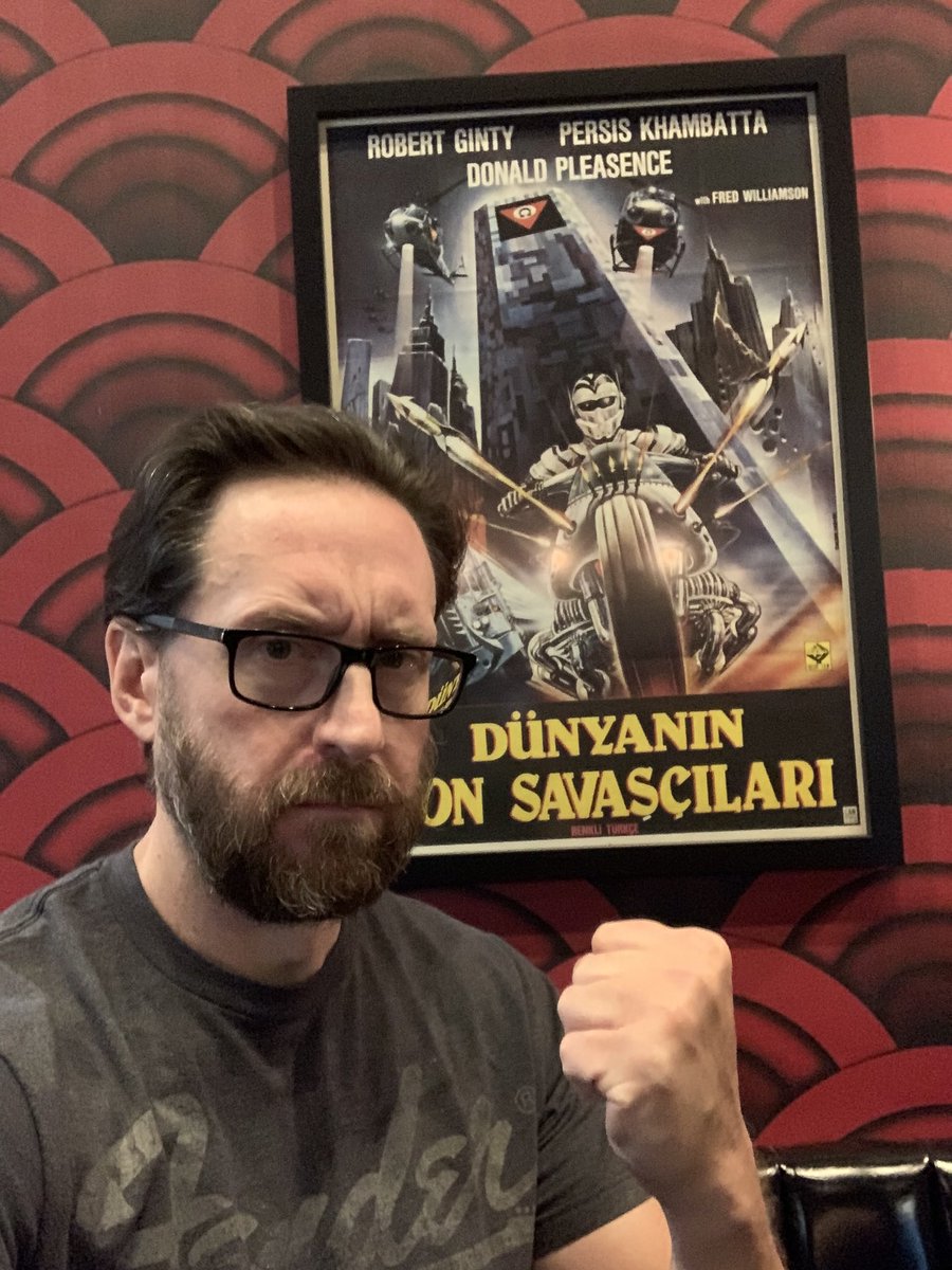 Me posing with this poster on two separate occasions is proof positive that I legit love this movie and Ginty #MondayActionMovie #WarriorsOfTheLostWorld #Ginty4Life