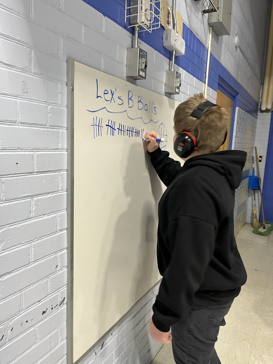 VPJenGatopoulos's tweet photo. This young man is passionate about breaking his record for baskets during our gym periods! He kept track with tally marks, added them up, and discovered he has a new record! So many skills in one fun activity! @JH_Jayhawks @GEDSB #gym #math #tally #basketball https://t.co/BVfCX2awMx