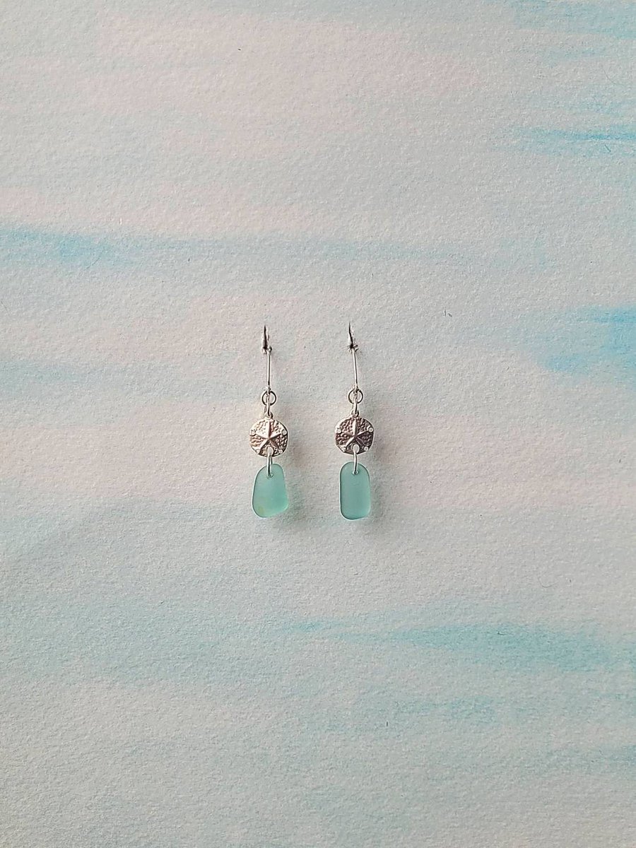 Thanks, Michelle! ★★★★★ 'Beautiful! My daughter will love these! Exactly as pictured.' etsy.me/3Z7yguS #seaglassjewelry #genuineseaglass #seaglassearrings #aquaseaglass #SaltyLassSeaGlass #sanddollarearrings