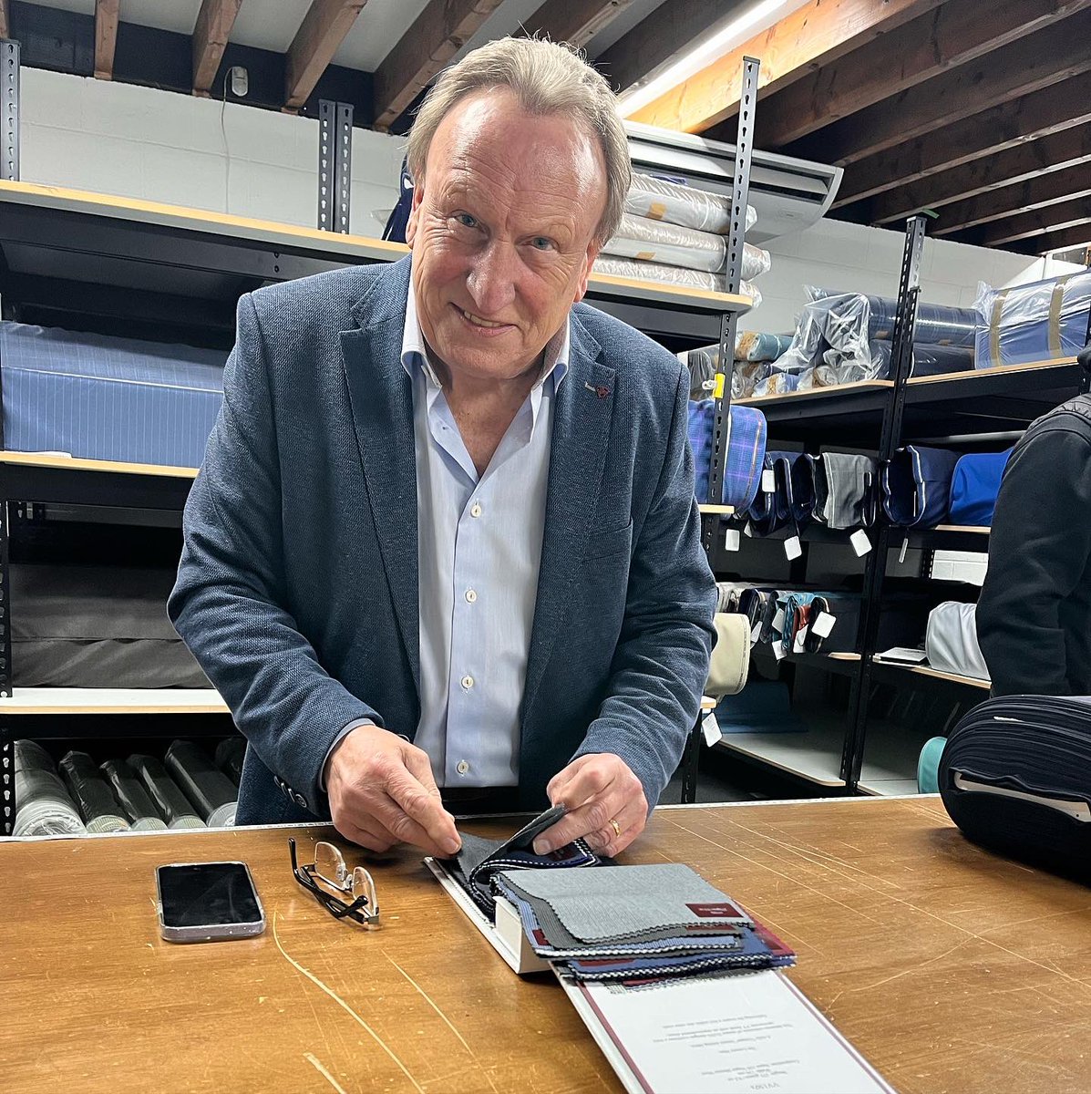 JB_Tailors's tweet photo. What an honour to welcome @warnockofficial to Jacob Brian Tailors 

Neil went for VV150 H7348 Dark Grey Plain with lots of personalisation and a very special message under the Melton 👊🏻⚽️

Can you guess what it might be ?? 🤔

#madetomeasure #cloth #suiting #htafc #terriers https://t.co/KQZ6Cqaa3R