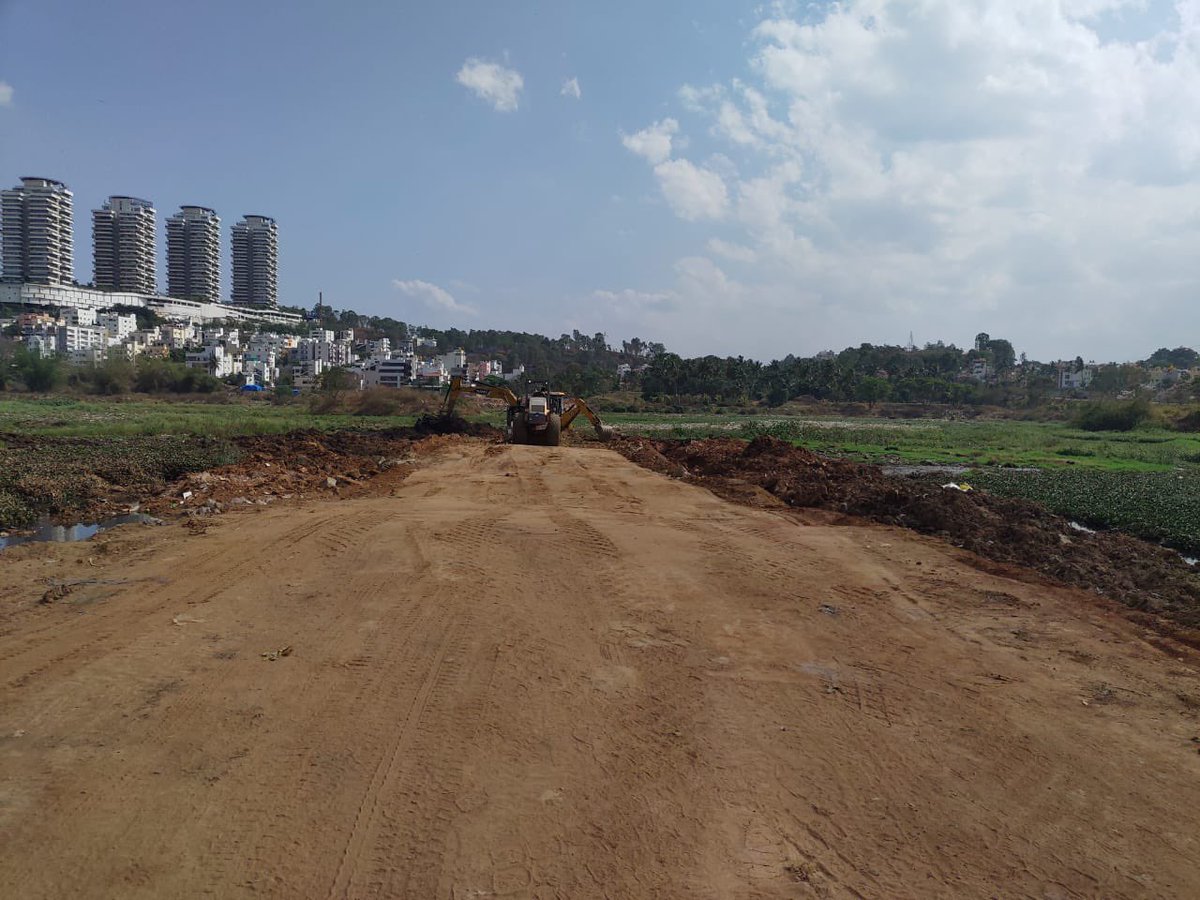 naveenmzs's tweet photo. This approach road — which the BBMP is hurriedly building right inside the Hosakerehalli lake in RR Nagar — is expected to double the value of one particular apartment complex 

Work taken up without KTCDA’s approval. Residents helpless @BSBommai @CMofKarnataka @Coalition4Water https://t.co/mL4fh2SKKd
