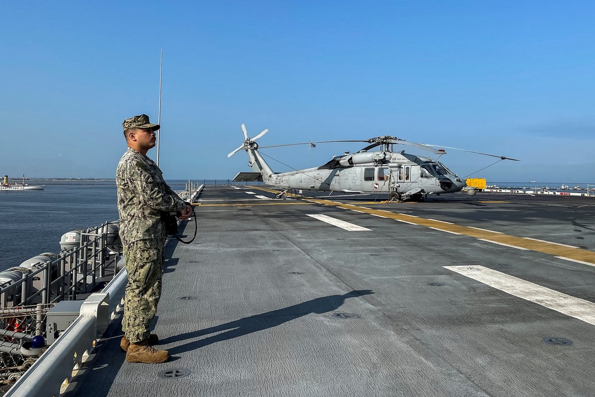 rapplerdotcom's tweet photo. The USS America (LHA-6) amphibious assault ship docked at a port in Manila on Tuesday, March 21. Photos by Adrian Portugal/Reuters https://t.co/hTuGRWo8tS