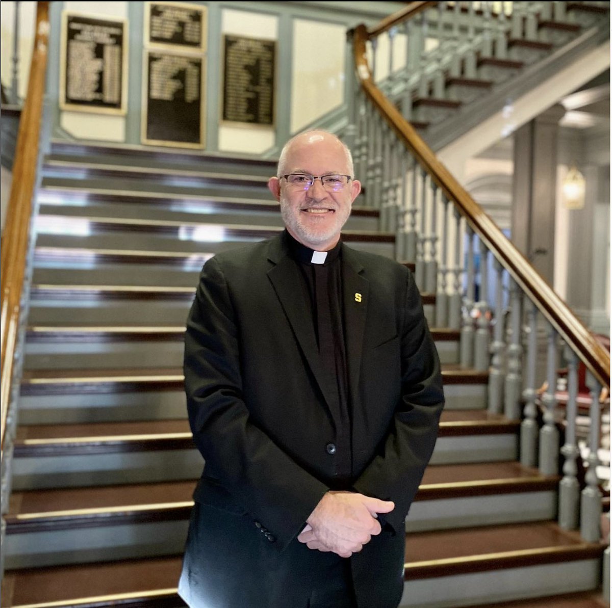 Salesianum's tweet photo. Gov. John Carney appointed Principal Fr. Chris Beretta to the DIAA Board of Directors. The Senate confirmation was held last week at Delaware Legislative Hall. Congratulations! #diaa #delhs https://t.co/t7K0c79Lcf