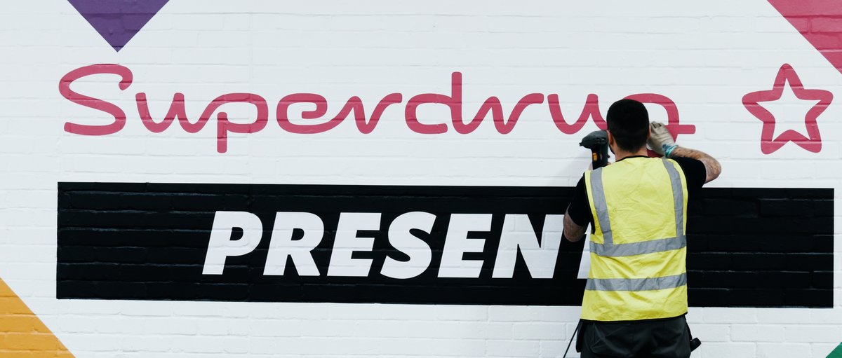 DHBlive's tweet photo. It's been a few weeks, and the dust has settled on what was an amazing sell out event, working with our friends at N2O, DHB delivered multiple stands in various formats, hundreds of meters of venue branding to make the Superdrug Presents ping with vibrant colour. 
 #events https://t.co/4mMBiKYY1W
