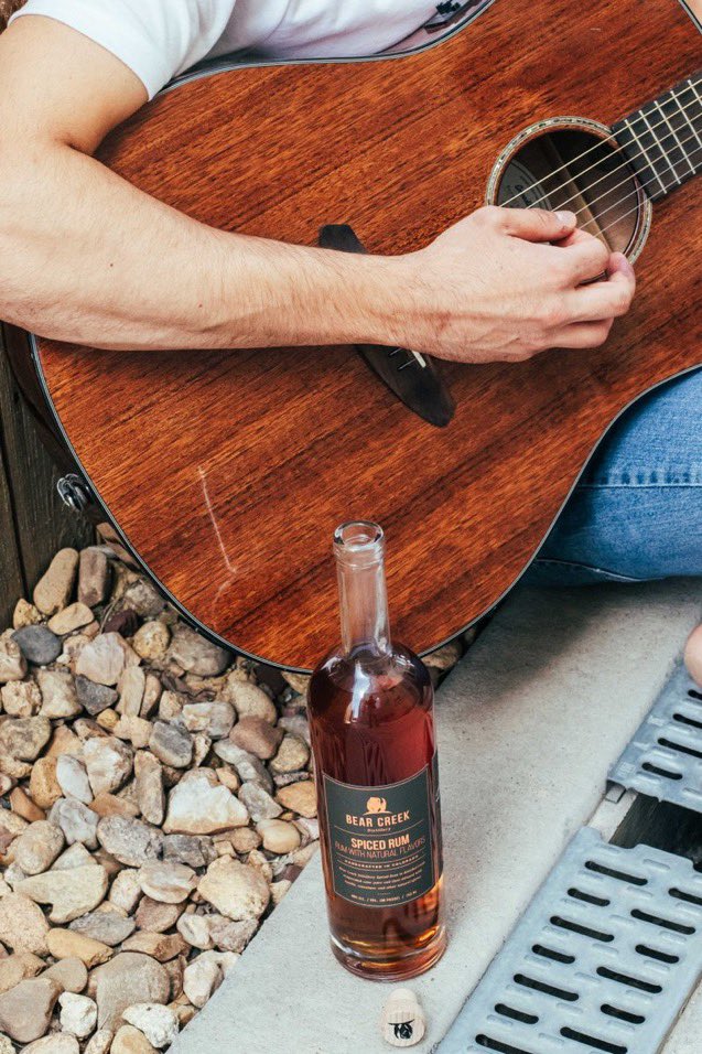 StillBearCreek's tweet photo. Strumming alongside our Spiced Rum! #comecraftwithus #distilledindenver #knowyourspirits #readthelabel #whatsinyourbottle #coloradomade #coloradoowned #handcrafted #craftspirits #rawsugar #rum #canetotable #spicedrum #bcd #borninlakewood #raisedindenver #whatareyoudrinking https://t.co/2yFuhmvBPN