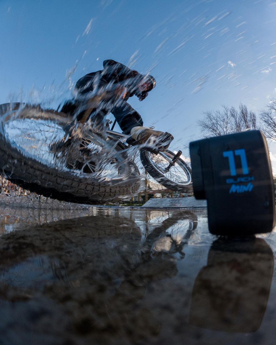 No matter the weather, make a splash with #GoProHERO11 Black Mini, and capture stunning 24.7 megapixel still photos. 📸 🚲 : #GoProFamily member rodrigovicentebmx (IG) #GoPro #GoProUK #Splash #Rain #Bike #Puddle